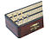 closeup view of brass inlaid cribbage board
