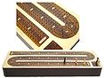Front and close up view of 4 tracks and points inlaid on cribbage board