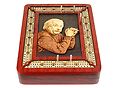 3 Track continuous cribbage board with Einstein 3D image inlaid